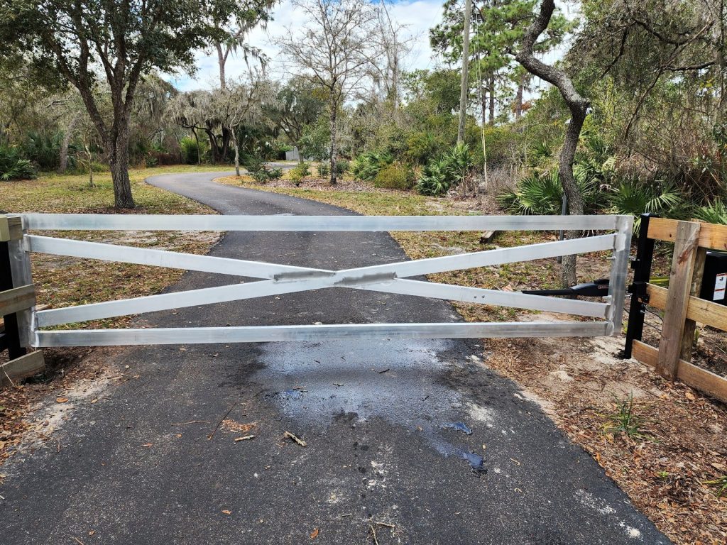 White X-Brace Farm Gate installed by KSM Gates in the Tampa Bay area